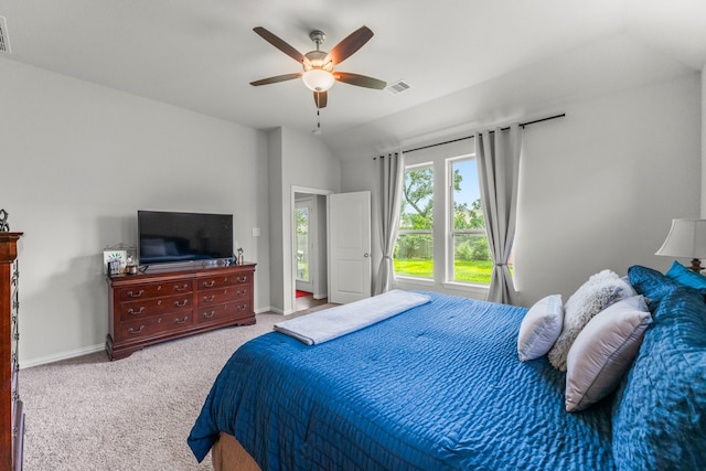 819 Spruce Pine Dr, Conroe, TX 77318 - carpeted bedroom with vaulted ceiling, ceiling fan, and baseboards