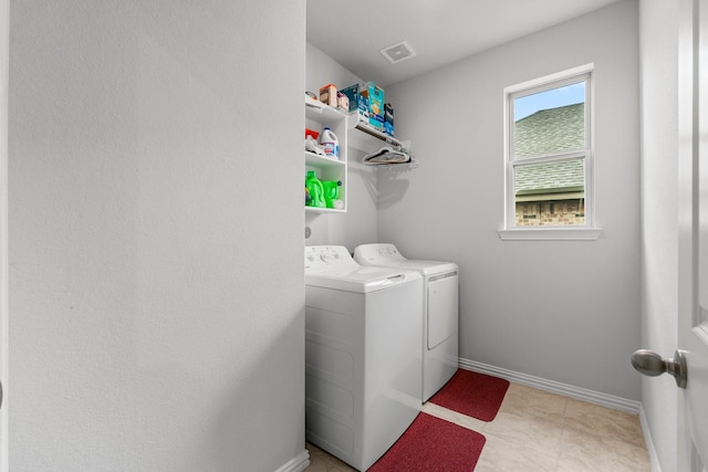 819 Spruce Pine Dr, Conroe, TX 77318 - laundry area with independent washer and dryer and baseboards