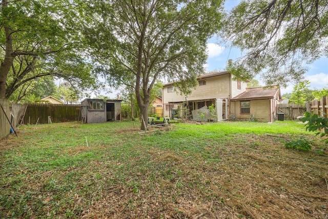 11826 Hallowing Point Rd, Houston, TX 77067 - view of yard with an outdoor structure, a storage shed, and cooling unit