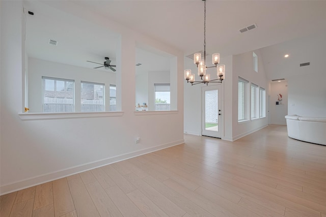 2610 Texas Orange Trl, Richmond, TX 77406 - unfurnished room featuring a chandelier, healthy amount of natural light, and light wood finished floors