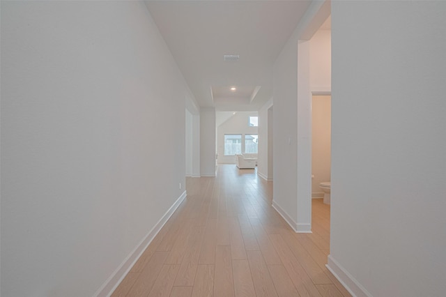 2610 Texas Orange Trl, Richmond, TX 77406 - hallway featuring baseboards, light wood-type flooring, and recessed lighting