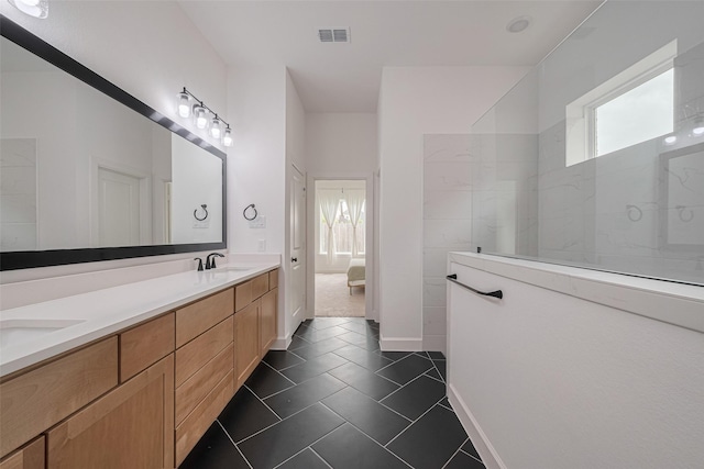2610 Texas Orange Trl, Richmond, TX 77406 - full bathroom featuring double vanity, tile patterned floors, a walk in shower, and ensuite bathroom