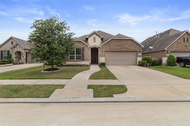 24730 Harbor Terrace Ln, Richmond, TX 77406 - view of front facade with brick siding, driveway, an attached garage, and a front lawn