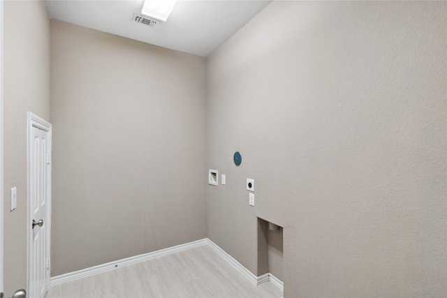 24730 Harbor Terrace Ln, Richmond, TX 77406 - washroom featuring electric dryer hookup, light wood-style floors, hookup for a washing machine, and baseboards