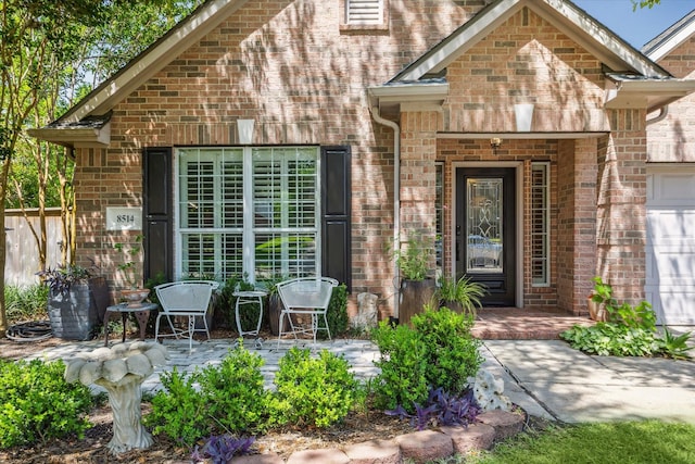8514 Babbling Brook Ct, Sugar Land, TX 77479 - doorway to property featuring brick siding