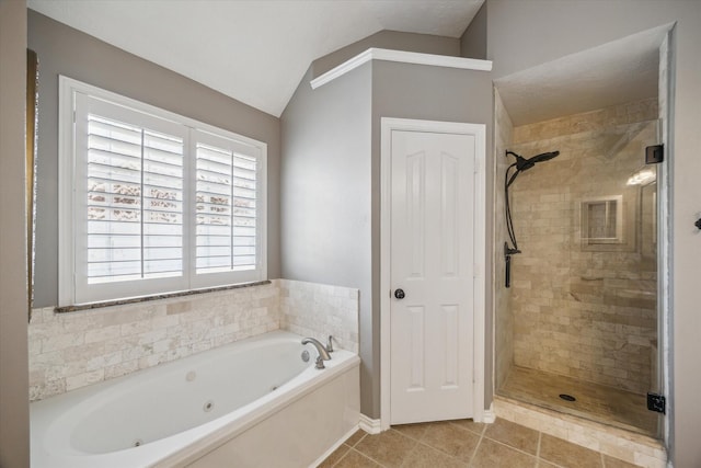 8514 Babbling Brook Ct, Sugar Land, TX 77479 - full bath with a stall shower, a tub with jets, lofted ceiling, and tile patterned flooring