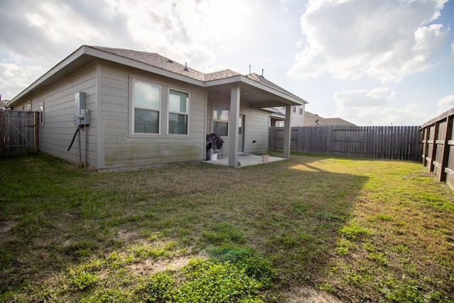 7735 Nevaeh Crest Path, Houston, TX 77016 - rear view of house featuring a patio