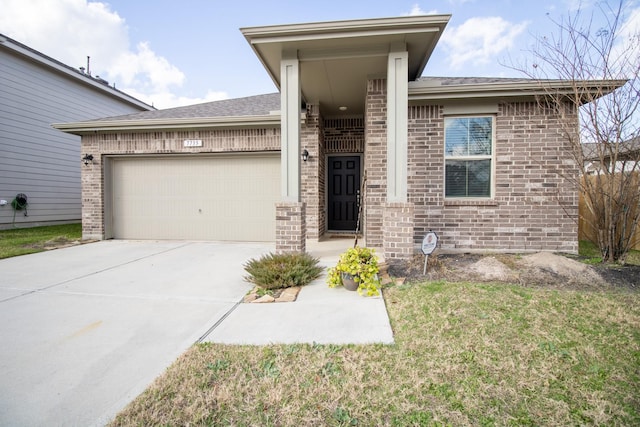 7735 Nevaeh Crest Path, Houston, TX 77016 - view of front of home featuring an attached garage, brick siding, driveway, and a front yard