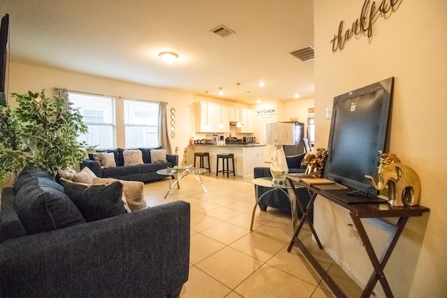 7735 Nevaeh Crest Path, Houston, TX 77016 - living room with light tile patterned floors