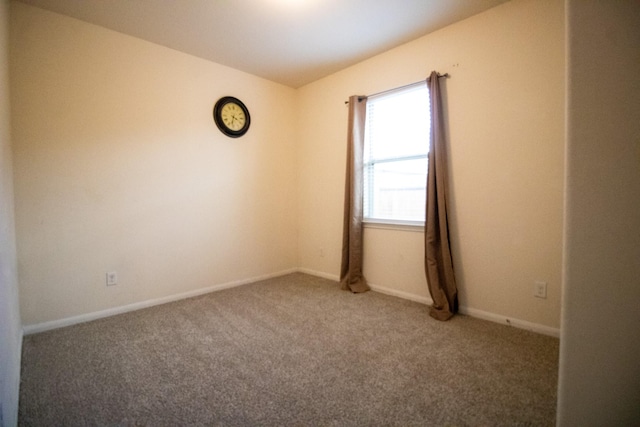 7735 Nevaeh Crest Path, Houston, TX 77016 - carpeted empty room featuring baseboards