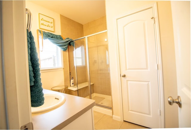 7735 Nevaeh Crest Path, Houston, TX 77016 - full bath with tile patterned flooring, a shower stall, and vanity