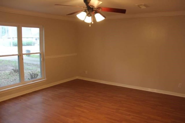 4906 Havenwoods Dr, Houston, TX 77066 - spare room featuring healthy amount of natural light, wood finished floors, baseboards, ceiling fan, and crown molding