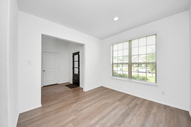 24063 Hawthorn Lakes Dr, New Caney, TX 77357 - spare room featuring wood finished floors, baseboards, and recessed lighting