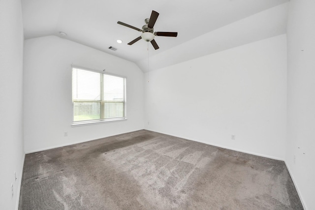 24063 Hawthorn Lakes Dr, New Caney, TX 77357 - spare room featuring lofted ceiling, carpet floors, and ceiling fan