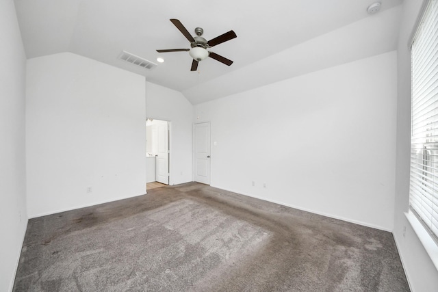 24063 Hawthorn Lakes Dr, New Caney, TX 77357 - unfurnished room with a smoke detector, vaulted ceiling, ceiling fan, and carpet
