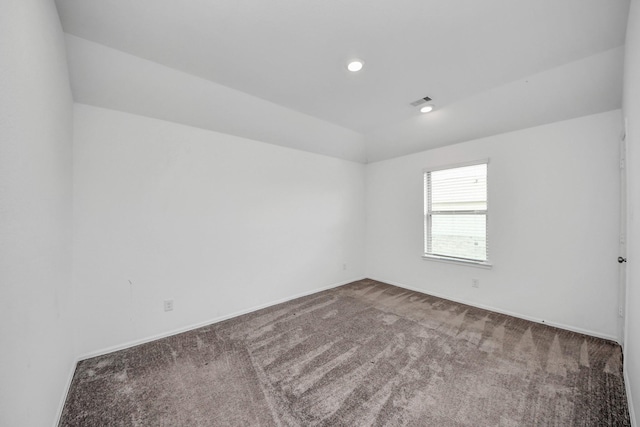 24063 Hawthorn Lakes Dr, New Caney, TX 77357 - carpeted empty room featuring baseboards and recessed lighting