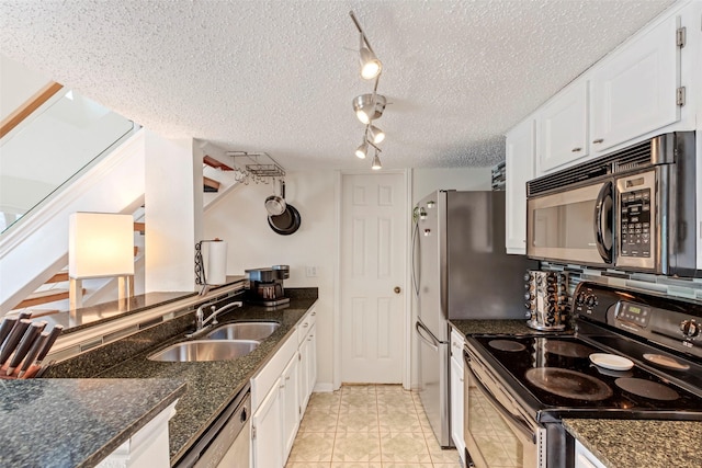 2300 Old Spanish Trl Unit 2059, Houston, TX 77054 - kitchen featuring electric stove, a sink, white cabinets, dark stone counters, and a textured ceiling