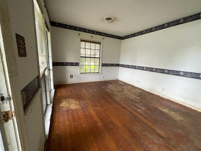 5048 Monroe St, Groves, TX 77619 - spare room with hardwood / wood-style floors and baseboards