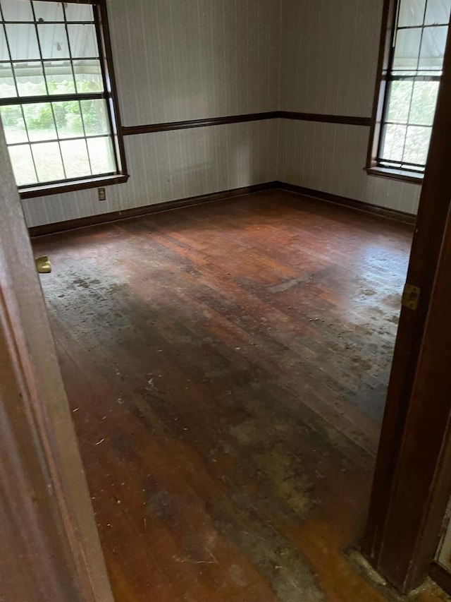 5048 Monroe St, Groves, TX 77619 - unfurnished room featuring hardwood / wood-style flooring
