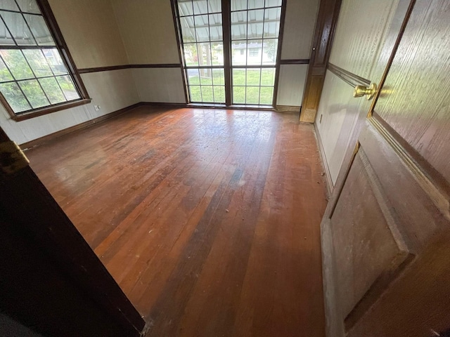 5048 Monroe St, Groves, TX 77619 - unfurnished room featuring light wood finished floors and baseboards