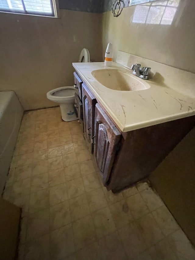 5048 Monroe St, Groves, TX 77619 - full bathroom featuring toilet and vanity