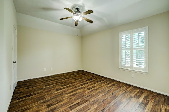 24635 Blue Opal Ln, Katy, TX 77494 - empty room with dark wood-type flooring, a ceiling fan, and baseboards