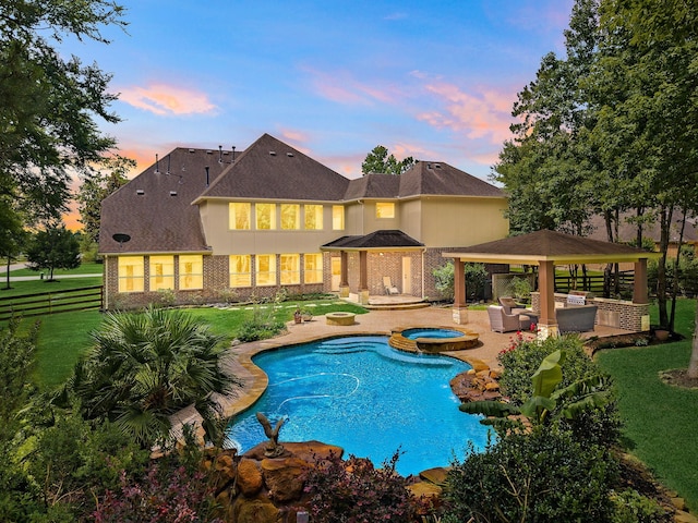 15210 Mccall Trce, Magnolia, TX 77355 - view of pool featuring a gazebo, a patio area, outdoor lounge area, and a pool with connected hot tub
