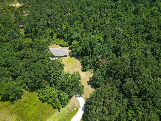 16048 Millican Dr, Splendora, TX 77372 - aerial view of a heavily wooded area