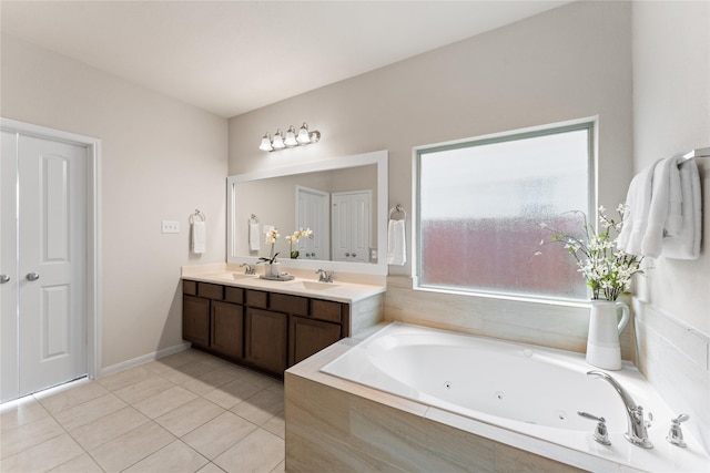 14818 Autumn Long Trl, Humble, TX 77396 - full bathroom featuring tile patterned floors, a jetted tub, and double vanity