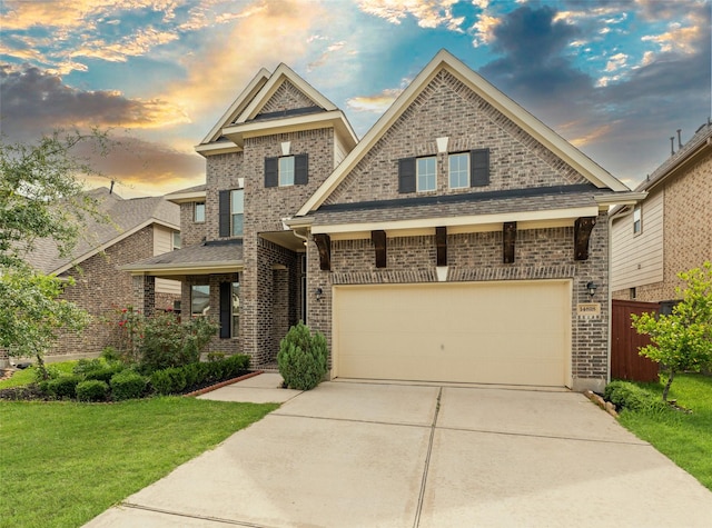 14818 Autumn Long Trl, Humble, TX 77396 - view of front of property featuring concrete driveway and brick siding