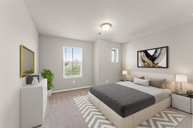 14818 Autumn Long Trl, Humble, TX 77396 - bedroom with light carpet and baseboards