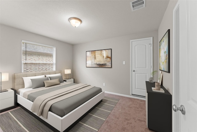 14818 Autumn Long Trl, Humble, TX 77396 - carpeted bedroom with baseboards and a textured ceiling