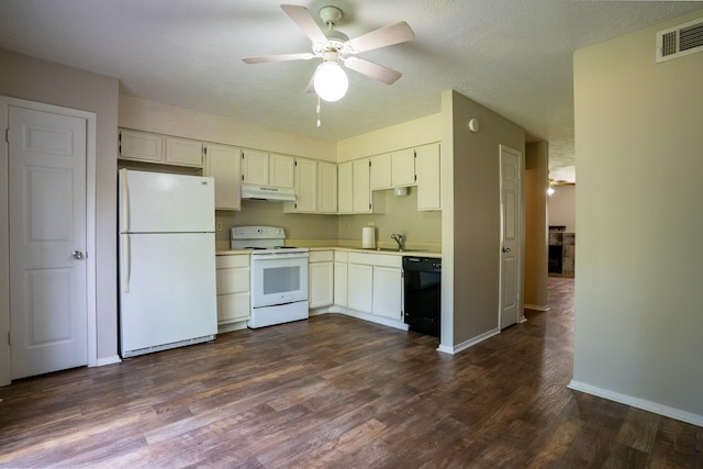 2521 Crosstimbers St Unit G3, Huntsville, TX 77320 - kitchen with white appliances, under cabinet range hood, a sink, ceiling fan, and dark wood-style floors