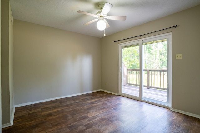 2521 Crosstimbers St Unit G3, Huntsville, TX 77320 - spare room featuring dark wood finished floors, baseboards, and ceiling fan