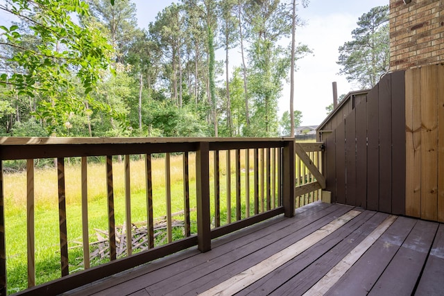 2521 Crosstimbers St Unit G3, Huntsville, TX 77320 - wooden terrace with a yard