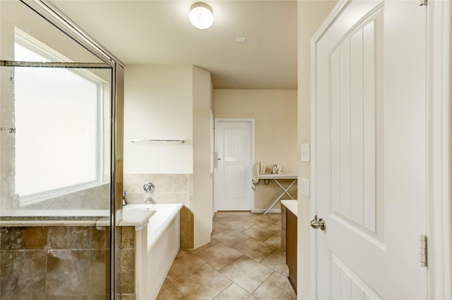 1610 Mason Knights Dr, Katy, TX 77493 - full bathroom featuring a bath, vanity, and tile patterned flooring