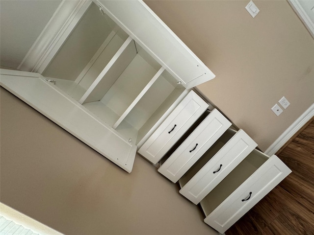 534 Oakdale Dr, Huntsville, TX 77320 - detailed view of wood finished floors and baseboards