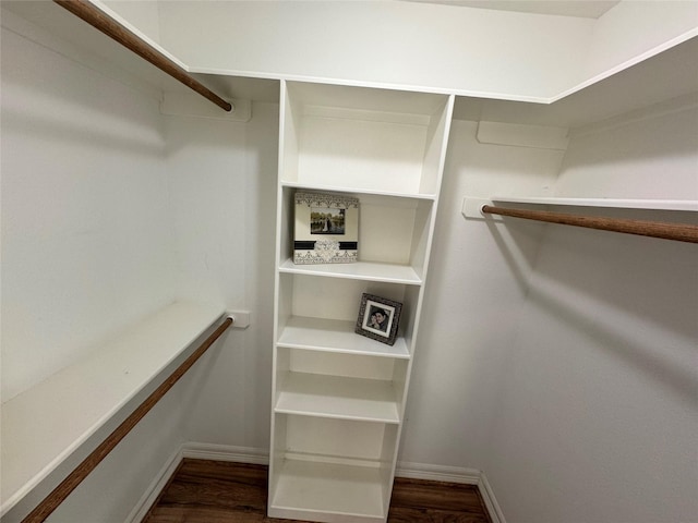 534 Oakdale Dr, Huntsville, TX 77320 - walk in closet featuring dark wood-style flooring