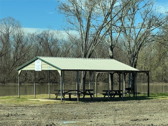534 Oakdale Dr, Huntsville, TX 77320 - view of property's community with a water view and a carport