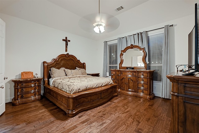 105 Checkerbloom Ct, Montgomery, TX 77316 - bedroom with dark wood-style flooring and ceiling fan