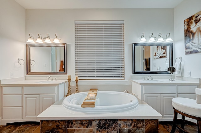 105 Checkerbloom Ct, Montgomery, TX 77316 - bathroom with a garden tub and two vanities