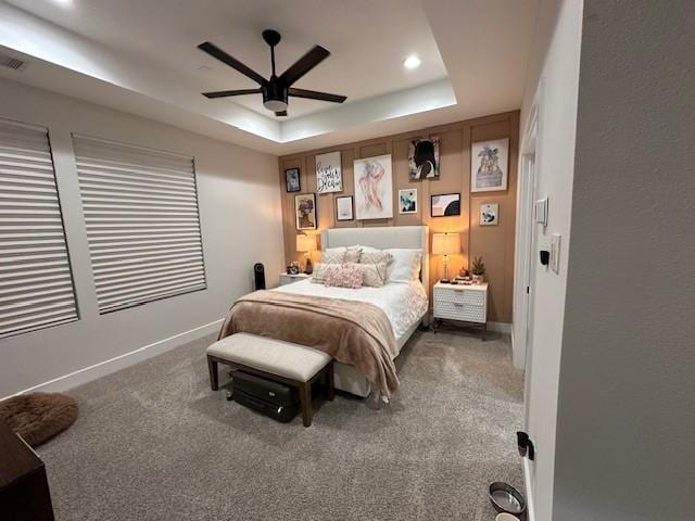 4816 Brinkman St, Houston, TX 77018 - carpeted bedroom with a tray ceiling, baseboards, recessed lighting, and ceiling fan