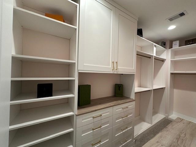 4816 Brinkman St, Houston, TX 77018 - walk in closet with wood finished floors
