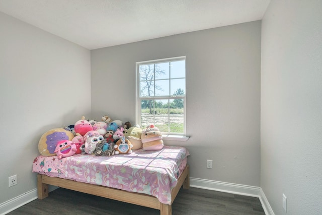 3508 Dick Barnes Loop, Bedias, TX 77831 - bedroom with wood finished floors and baseboards