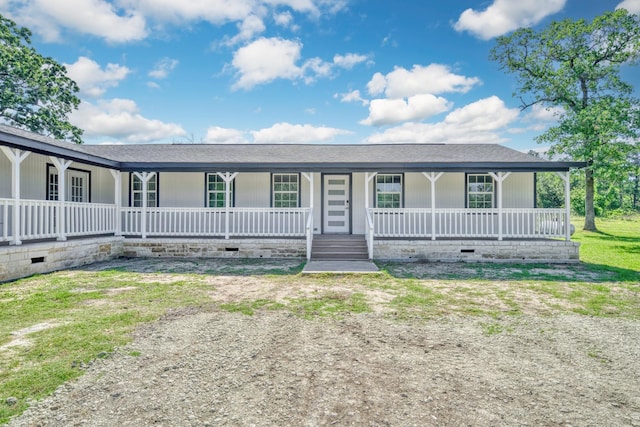 3508 Dick Barnes Loop, Bedias, TX 77831 - view of front of house with crawl space and covered porch