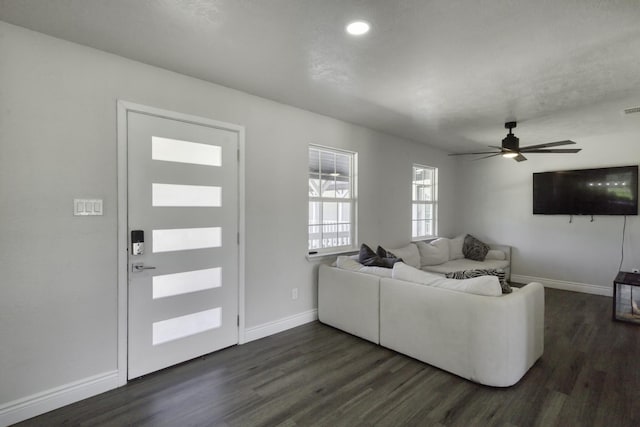 3508 Dick Barnes Loop, Bedias, TX 77831 - living area with dark wood-type flooring, baseboards, and recessed lighting