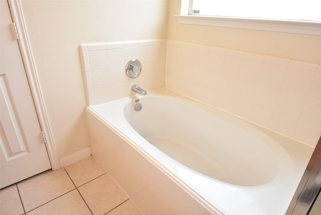 21031 Noelle Ct, Humble, TX 77338 - full bathroom featuring a garden tub and tile patterned flooring