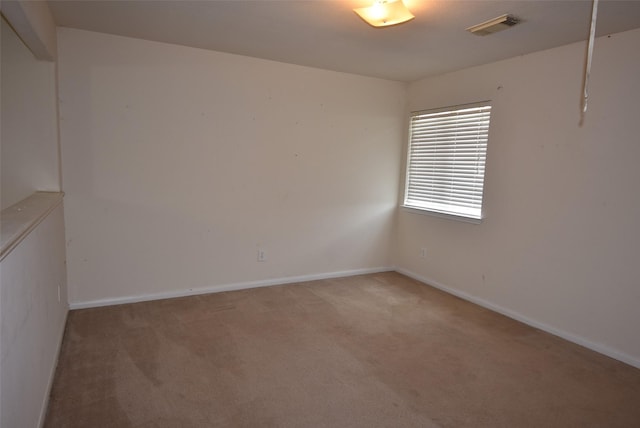 21031 Noelle Ct, Humble, TX 77338 - empty room featuring light carpet and baseboards