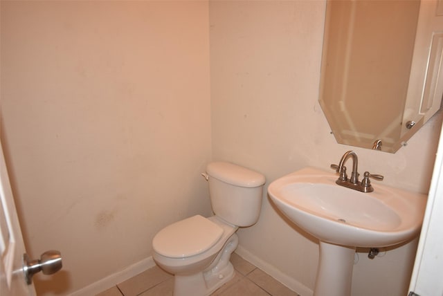 21031 Noelle Ct, Humble, TX 77338 - bathroom with toilet, tile patterned flooring, and baseboards