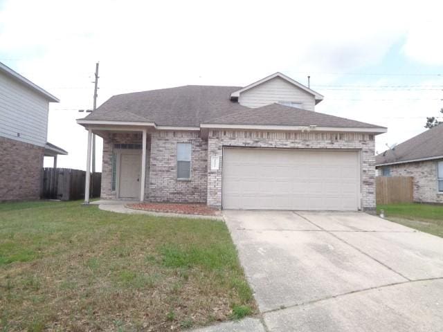 21031 Noelle Ct, Humble, TX 77338 - single story home featuring an attached garage, driveway, and brick siding